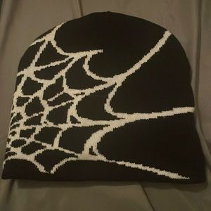 This is a black and white beanie spiderwebs this is comfortable and warm